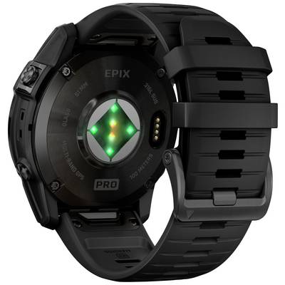 Rear view of a black sports watch with green illuminated sensors on the underside of the casing and a robust strap.