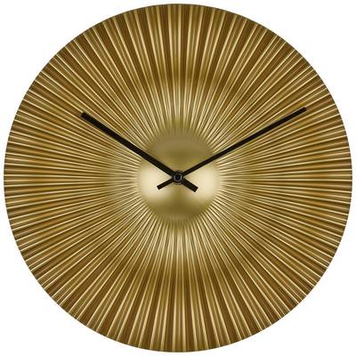 A golden wall clock with a radial pattern and black hands indicates the time.