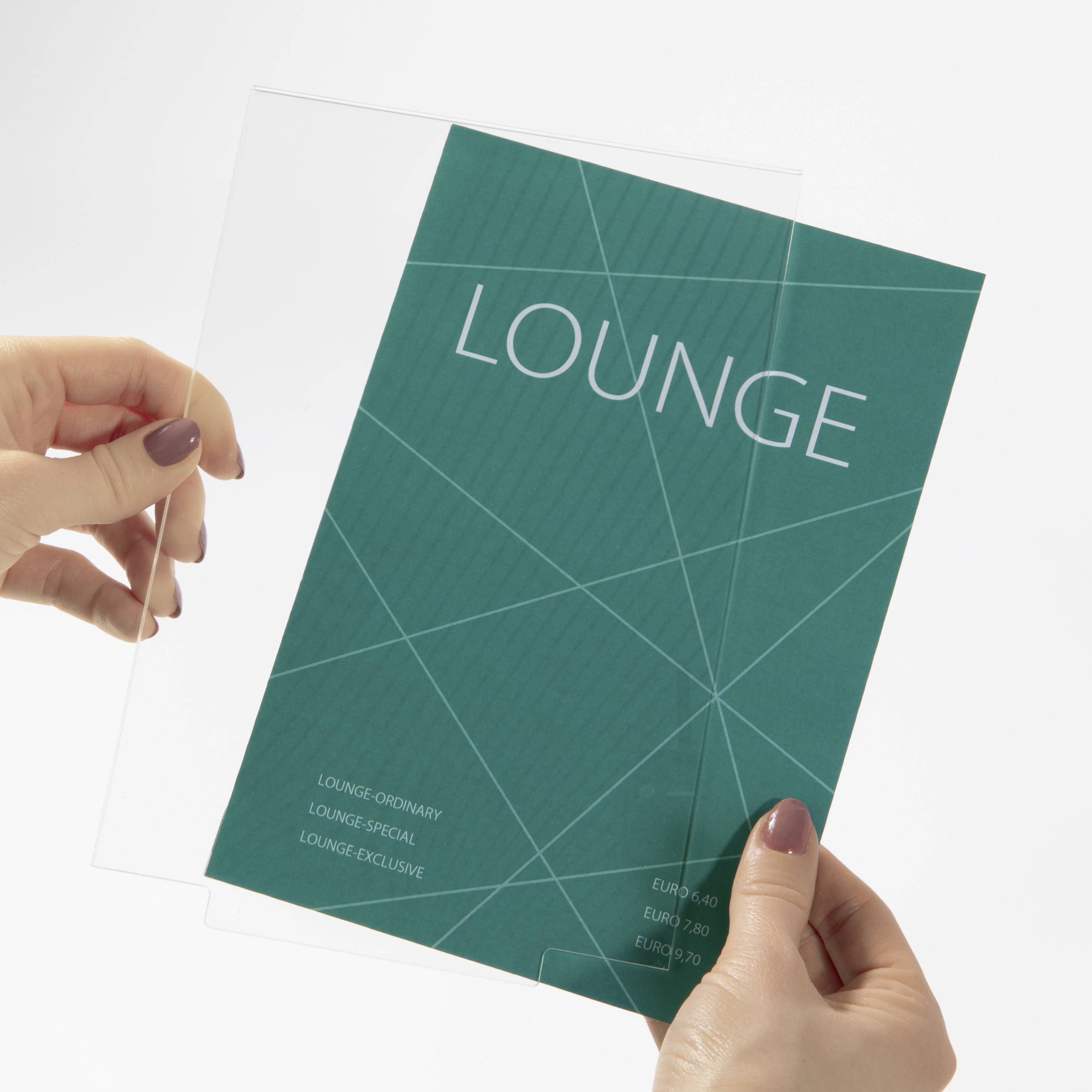 A person is holding two transparent, overlapping cards with the text 'LOUNGE'. Prices for 'ORDINARY', 'SPECIAL' and 'EXCLUSIVE' are displayed.