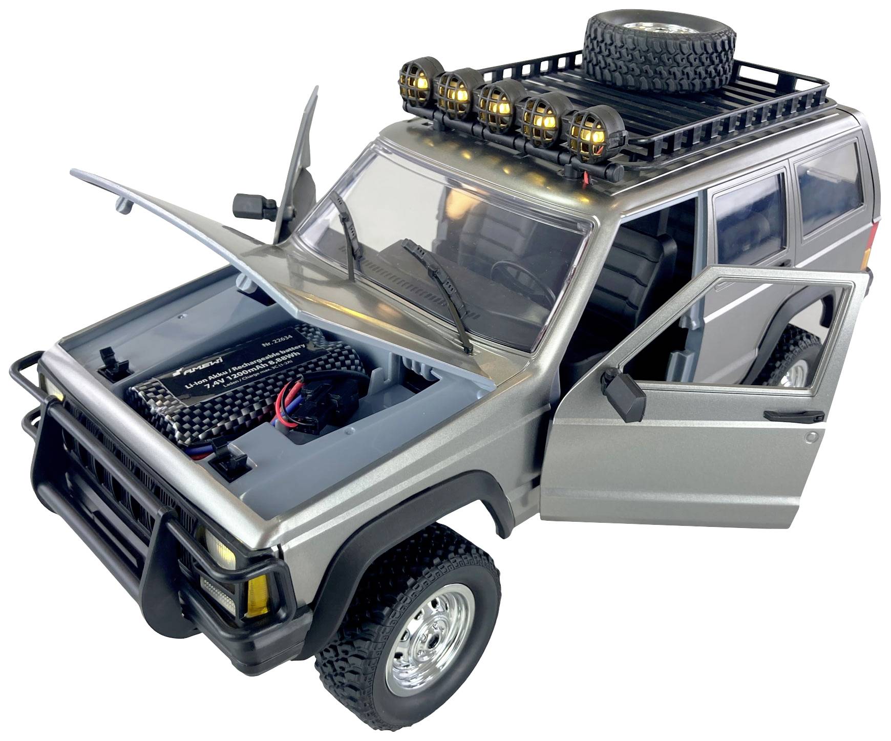 Model car of an off-road vehicle with open doors, raised bonnet, and roof rack with spare wheel and headlamps.