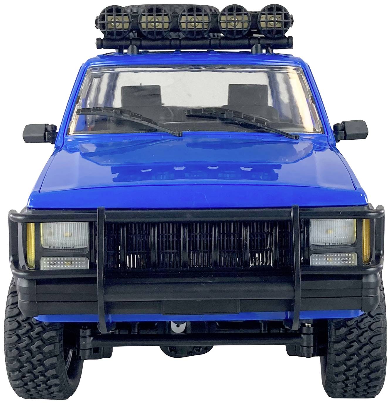 Blue, robust off-road vehicle with a large front grille and additional headlamps mounted on the roof, pictured head-on.