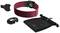 A red wristband with sensor, accessories and a mesh carry bag. It is used for monitoring fitness and health data.