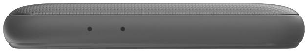 A flat, rectangular, grey electronic device with two small round ports on the side, possibly a speaker.