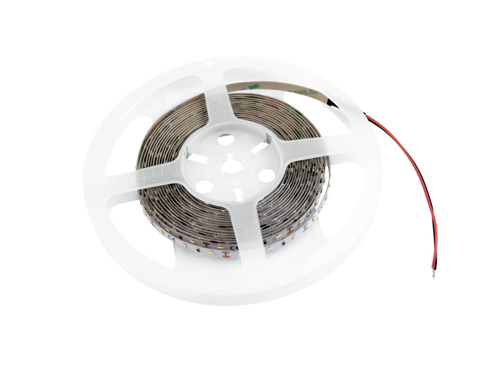 A roll of LED light strip with a red and black cable, on a white background.