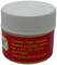 A small white plastic container with a red label shows ingredients: water, cellulose, abrasive, surfactant, boric acid. Capacity: 9 ml.