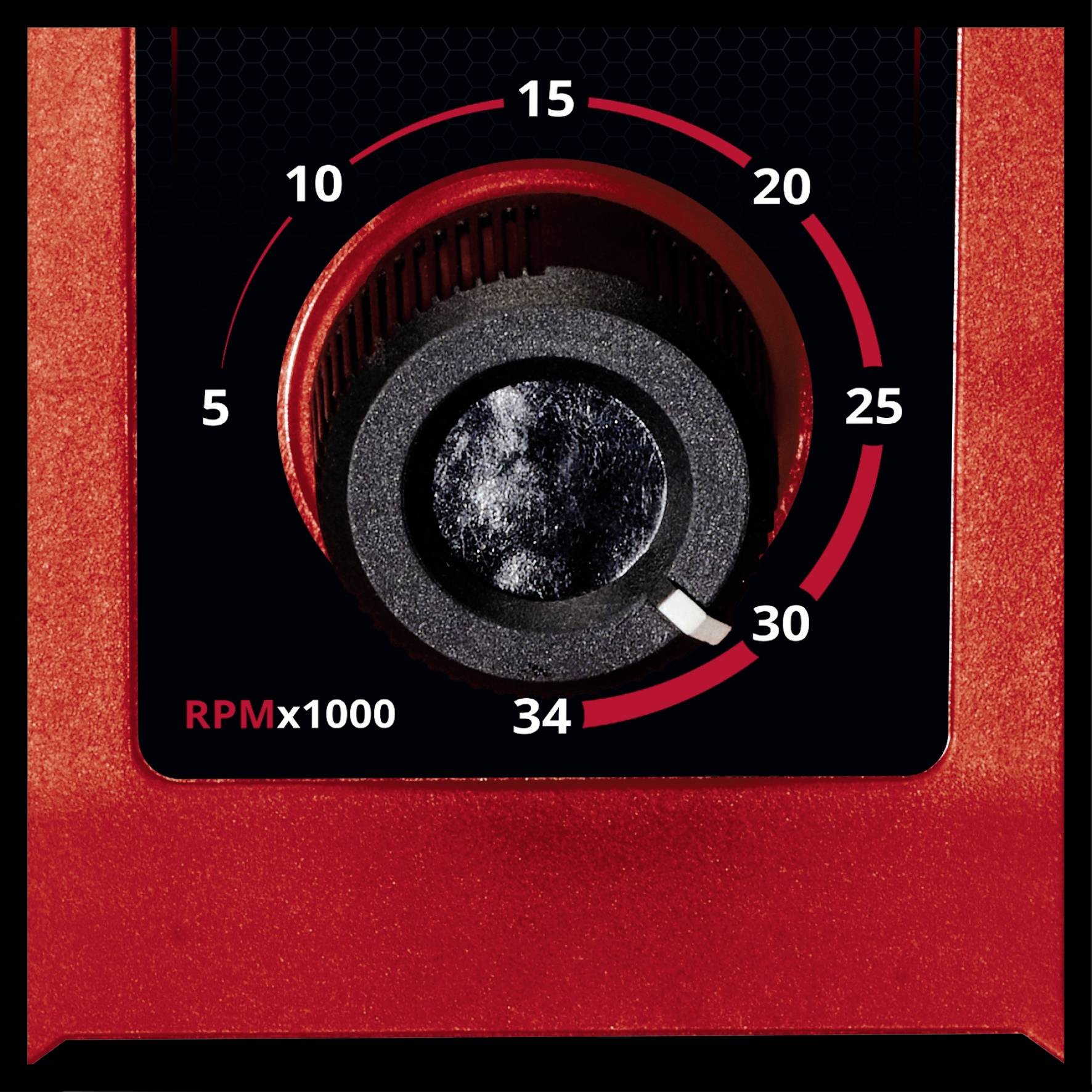 A tachometer in a red housing indicates 34,000 rpm (RPM x 1000).