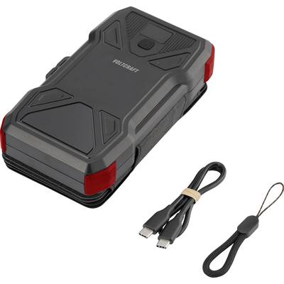 'Jump starter device with a USB cable and a small hand strap beside it. The device is black with red accents.'