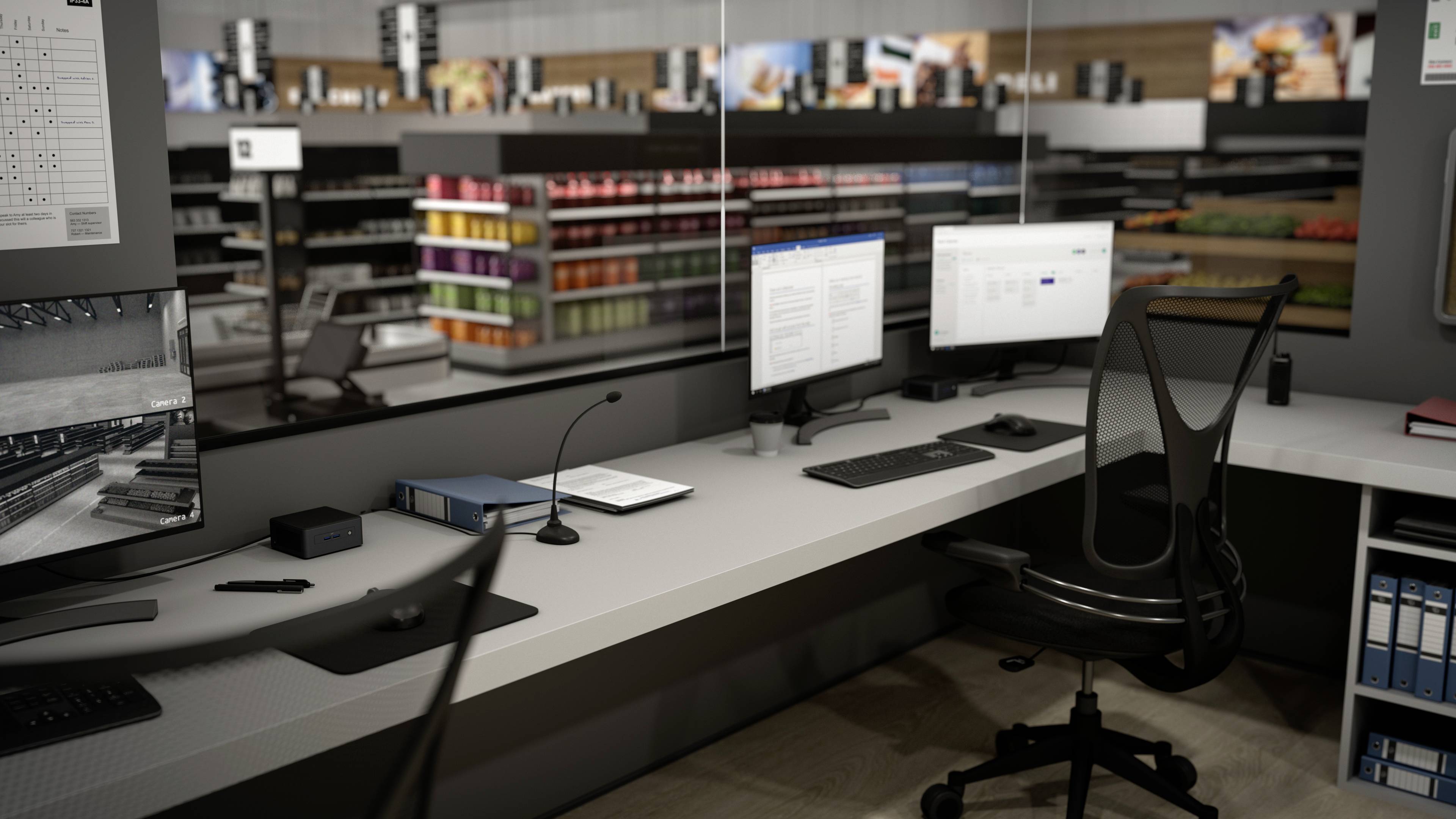 An office with two computers on a desk, shelves with products in the background, likely in a retail environment.