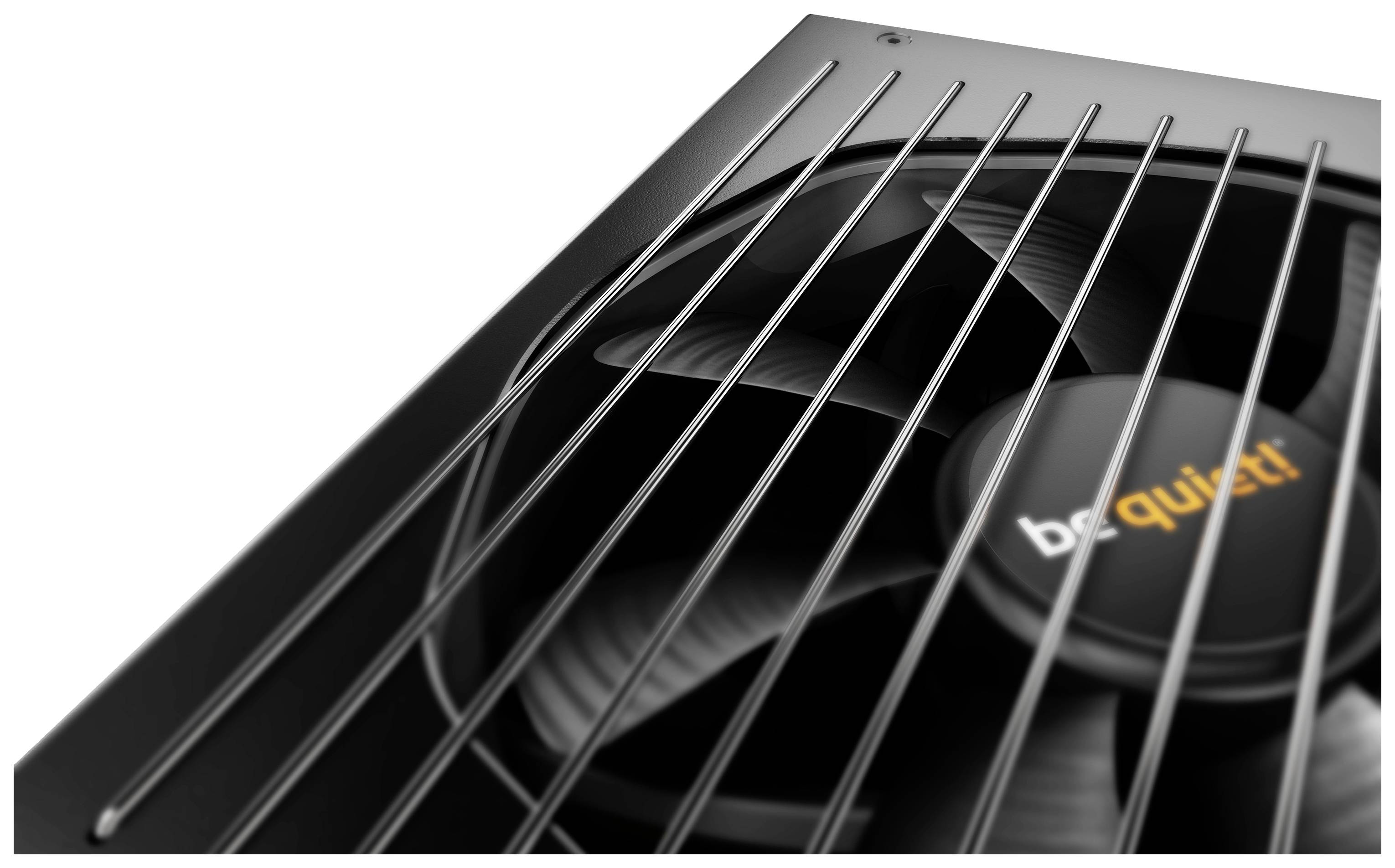 A black computer fan with a grille and the text 'be quiet!' in the centre of the fan, shown greatly magnified.