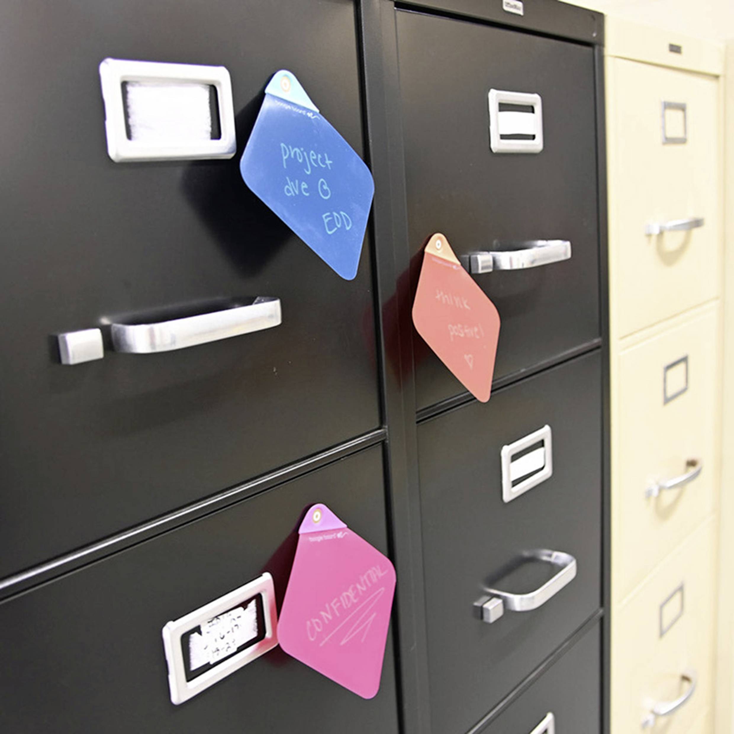 Black filing cabinets with coloured notes indicating tasks and deadlines, including 'Project G', 'Confidential' and 'High-Quality Paper'.