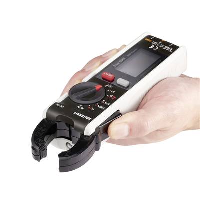 A hand is holding a digital ammeter with an open hinged clamp. The device displays measurement values on a screen and has multiple operation buttons.