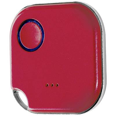A small, square, red device with rounded corners and a dark button. There are three small dots on the underside.