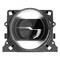 Headlamps of a vehicle, primarily circular with a metallic rim and clear elements, likely designed for intense illumination.
