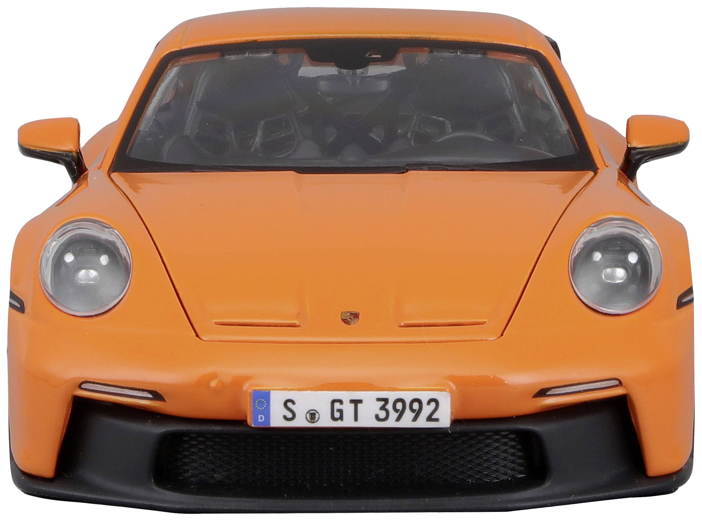 An orange, sporty car viewed from the front with a black-accented bumper and an open bonnet.