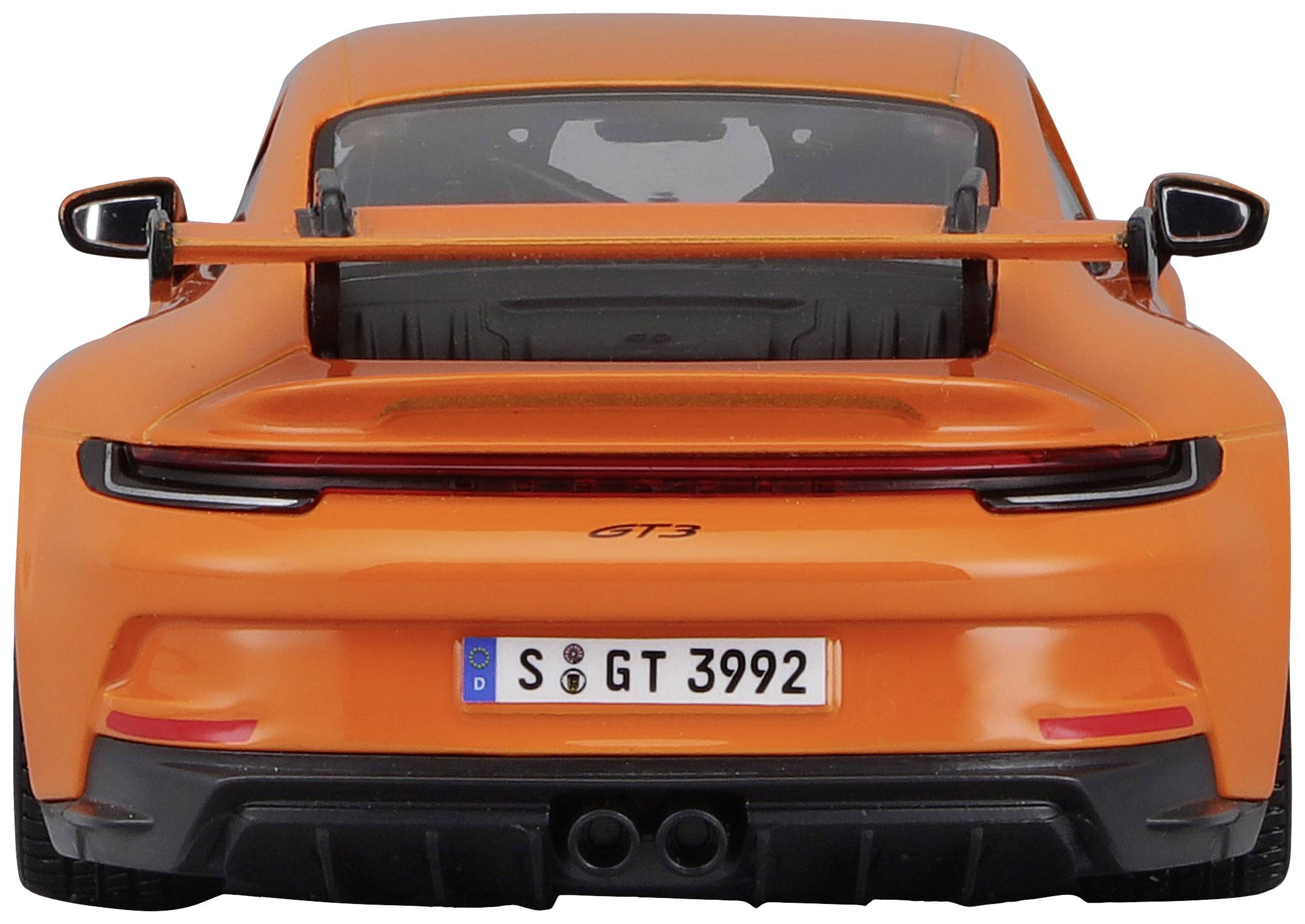 An orange sports car model from behind, with a spoiler and black diffuser. The number plate reads 'S GT 3992'.