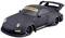A matte black sports car with large wing arches and a rear spoiler. 'RAUH-Welt' is written on the windscreen.