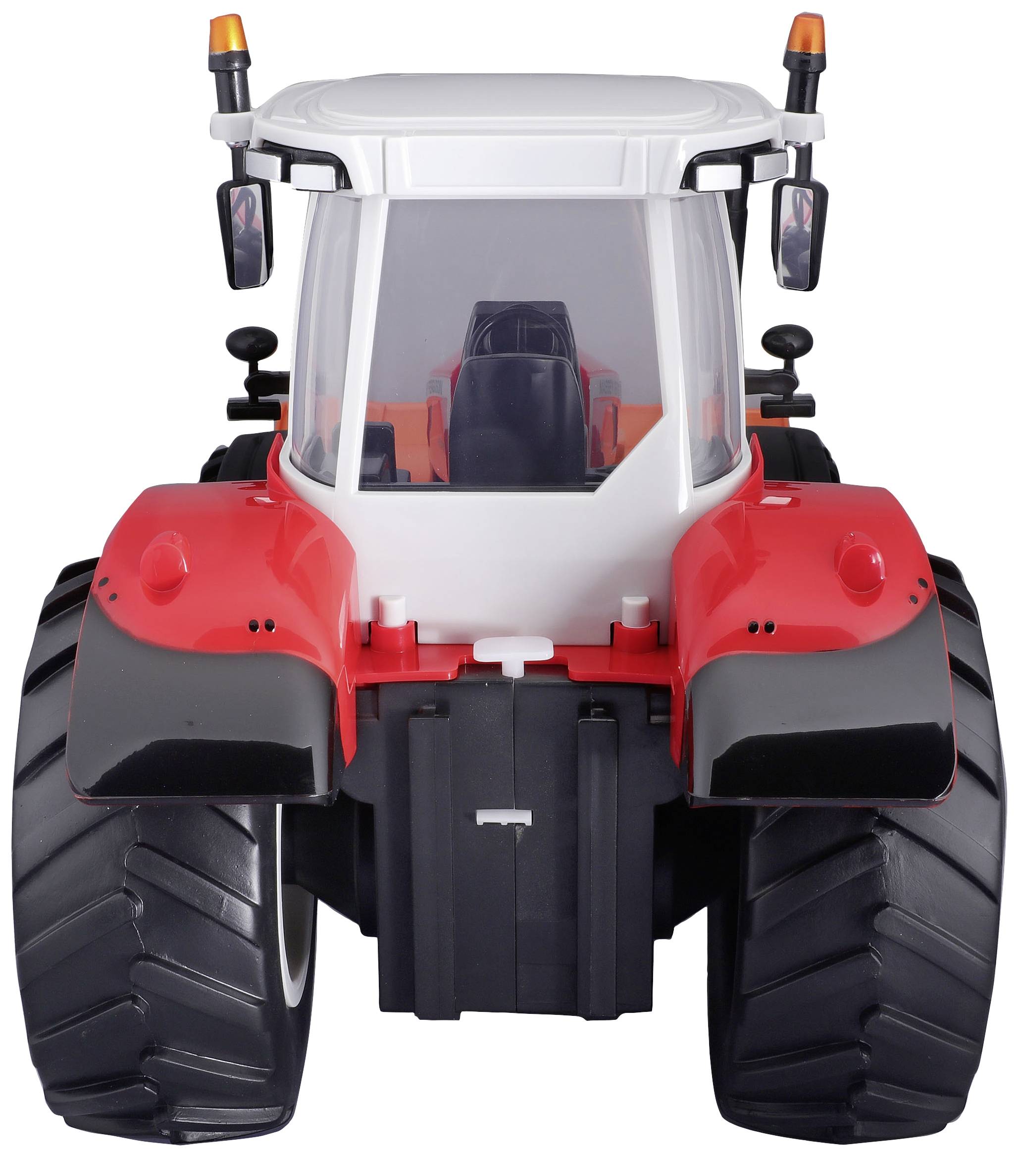 A red tractor with a large driver's cab, wide tyres, and wing mirrors. Front view.