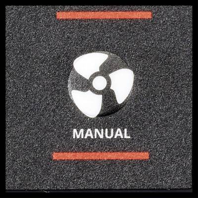 A black switch or button with a fan symbol and the inscription 'MANUAL' underneath, surrounded by red lines.