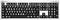 Black computer keyboard with large, high-contrast white letters and symbols, specifically designed for visually impaired users.