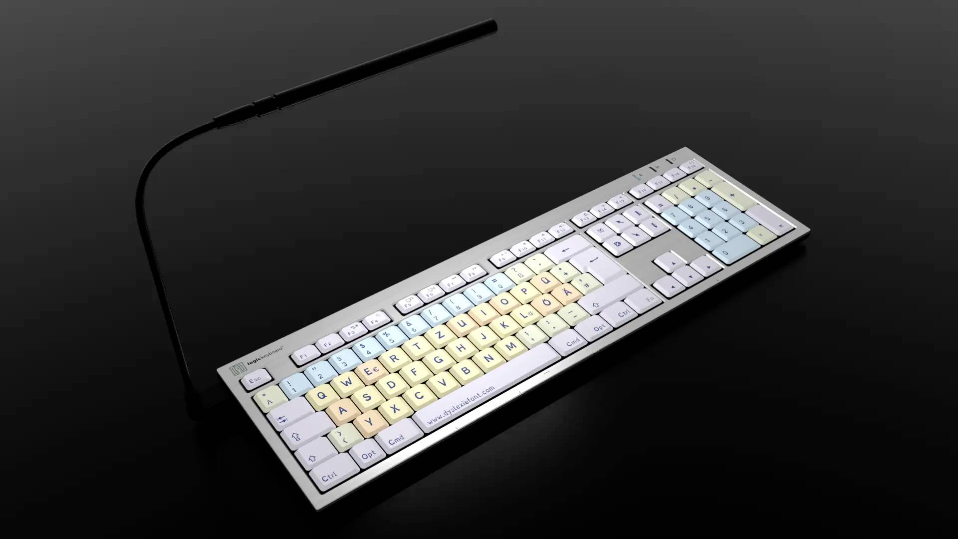 A backlit computer keyboard with coloured keys on a black background. The keys are designed in pastel colours.
