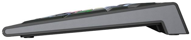 Side view of a keyboard with a low tilt angle and multiple keys in various colours on the top surface.