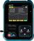 Portable digital oscilloscope with display showing a sinusoidal waveform. Controls and buttons for operation visible at the bottom.