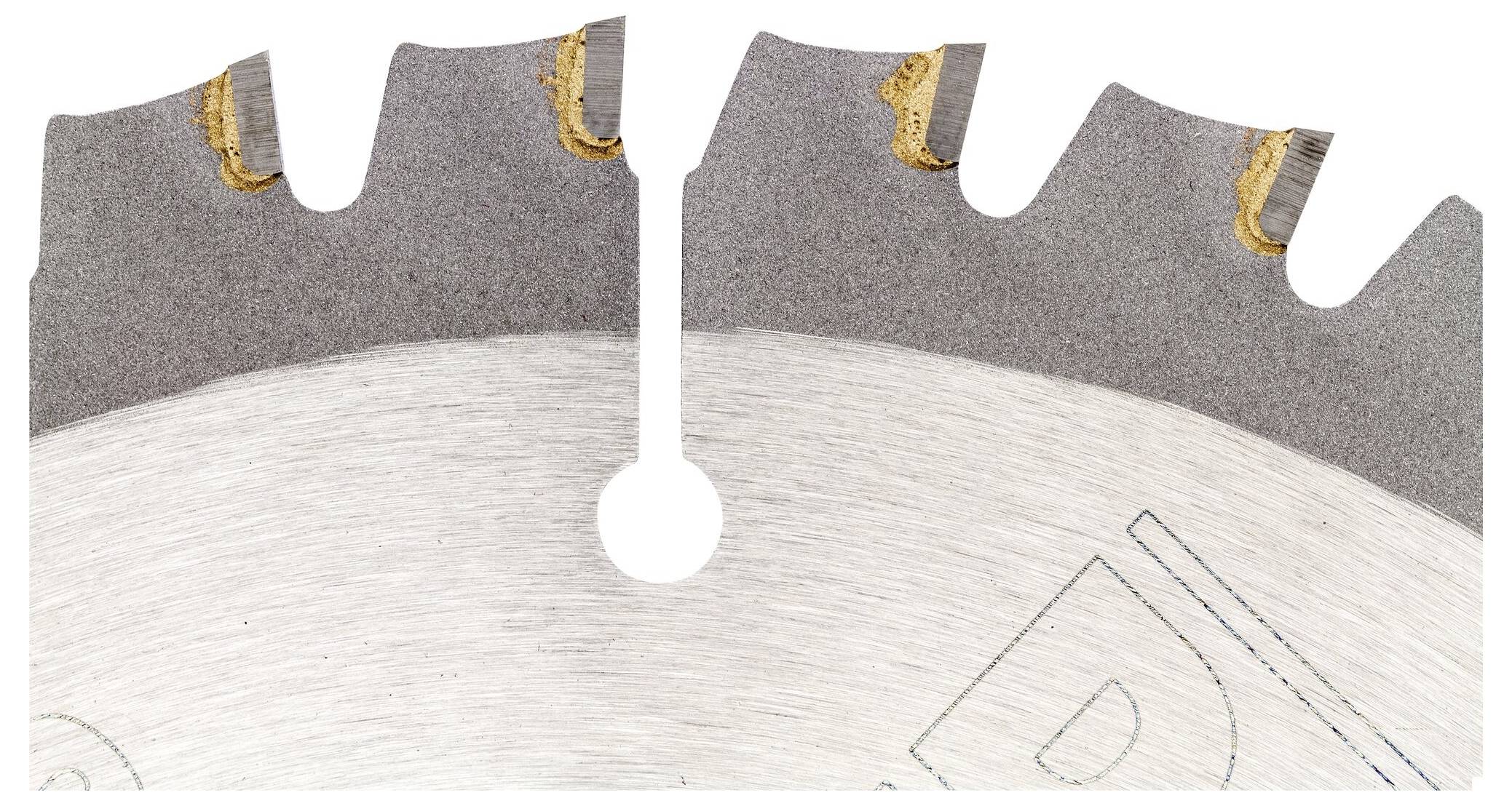 Close-up of a circular saw blade edge with visible teeth and notches. The surface is metallic with fine details.