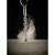 A drill penetrates a surface, dust billowing up. Dark background, focus on the metal drill bit and dust particles.