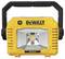 Yellow portable DeWalt work light with robust design, carry handle and silver reflector in the centre.