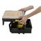 'A person opens a black toolbox with a transparent lid. The box contains several yellow compartments for storage.'