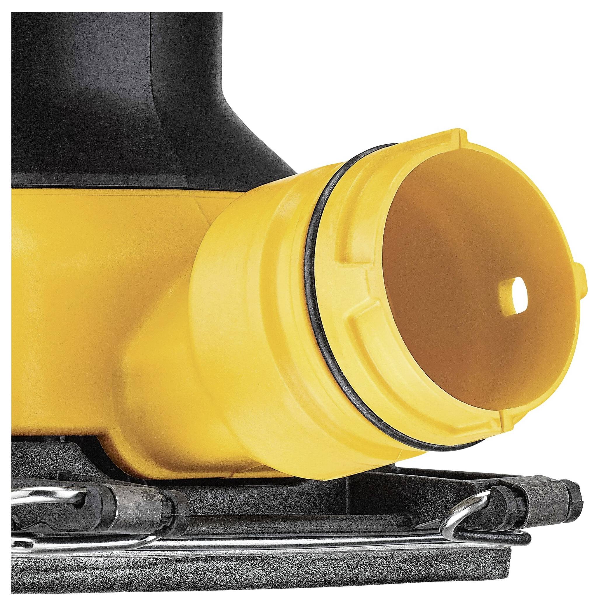 A yellow plastic component with a black sealing ring, part of a technical device, likely a connection piece.