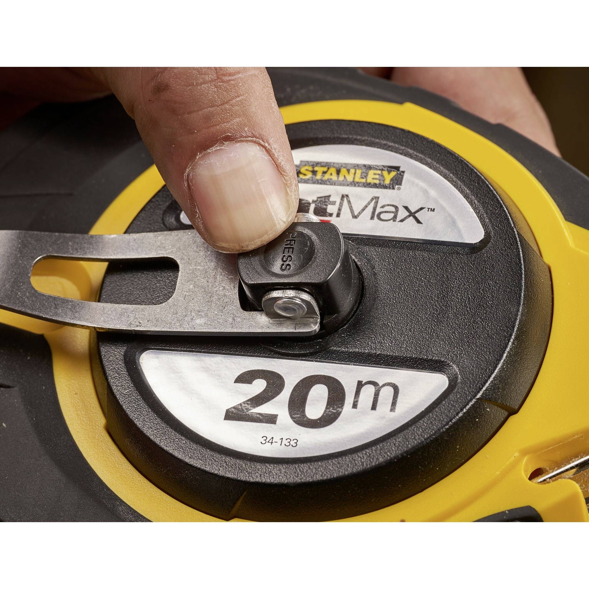 A 20-metre tape measure is being held with a finger. The brand name 'Stanley' is visible.