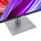 A modern ASUS monitor with a slim bezel and an elegant, silver stand is shown at an angle from the side.
