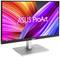 A monitor displaying 'ASUS ProArt' on its screen. The background features colourful, wave-like colour patterns.