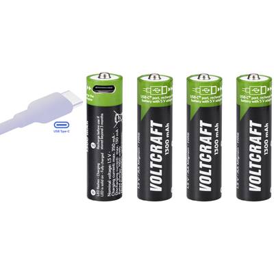 Four rechargeable Voltcraft AA batteries with a USB-C port for charging. A USB-C cable is positioned to the left of them.