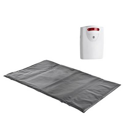 A grey pressure sensor mat with a white alarm device used for monitoring physical movement or position.