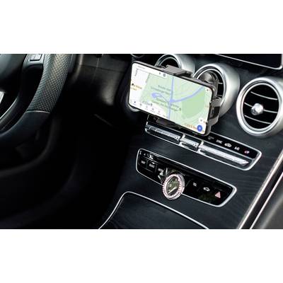 Smartphone navigation displays a map in a car, mounted on the dashboard. Major roads and a river are visible.