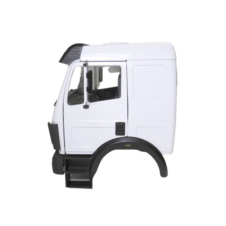 White lorry cabin viewed from the side, without wheels and bonnet, with visible door and windows on a white background.