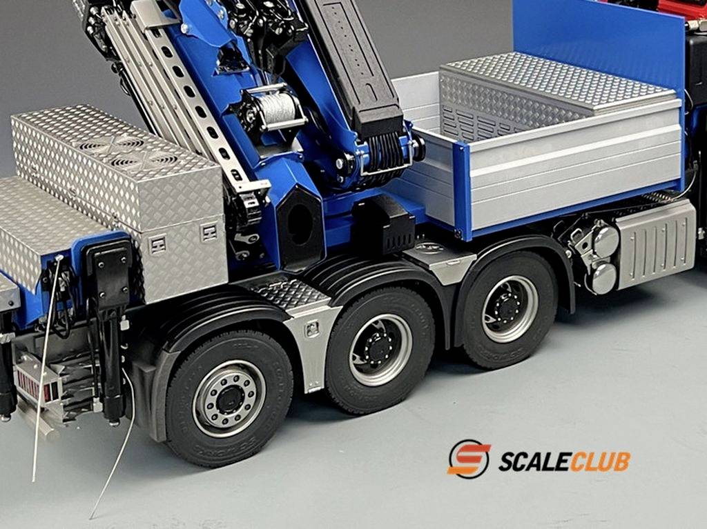 Toy military truck model with detailed structures, blue crane superstructure and grey loading area.