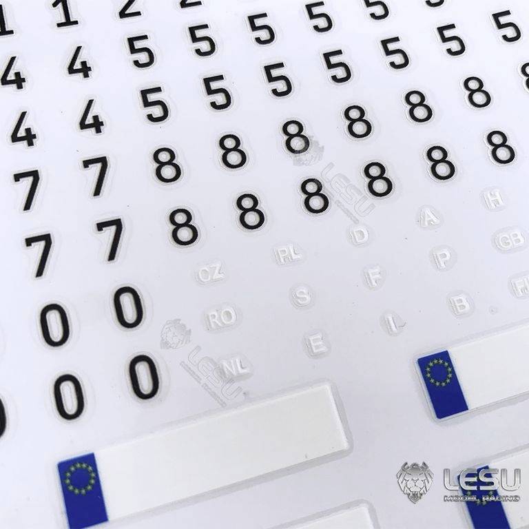 'Self-adhesive car stickers with letters and numbers in various font sizes, including EU country flags and number plates.'