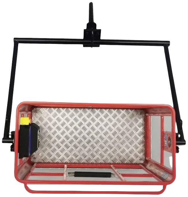 An empty, red-framed transport basket with a metal, non-slip base surface is secured in a holder.