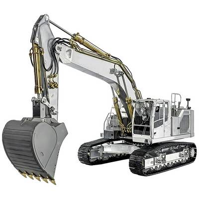 A large excavator with metal parts and hydraulic arms stands on tracks. The excavator is silver and has a large bucket.