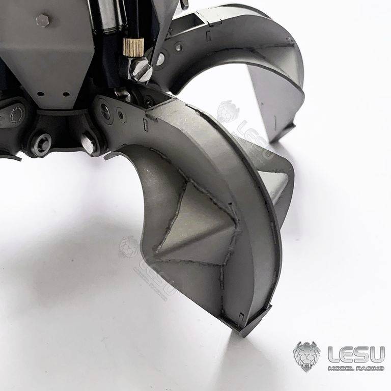 Industrial metal gripping tool with multiple curved gripping arms, used for holding or moving objects.