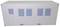 A white container with four rectangular windows and a door, used as a mobile office or storage space.