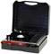Gas stove in a portable black case, opened, showing burners and control knob. Ideal for outdoor camping and travelling.