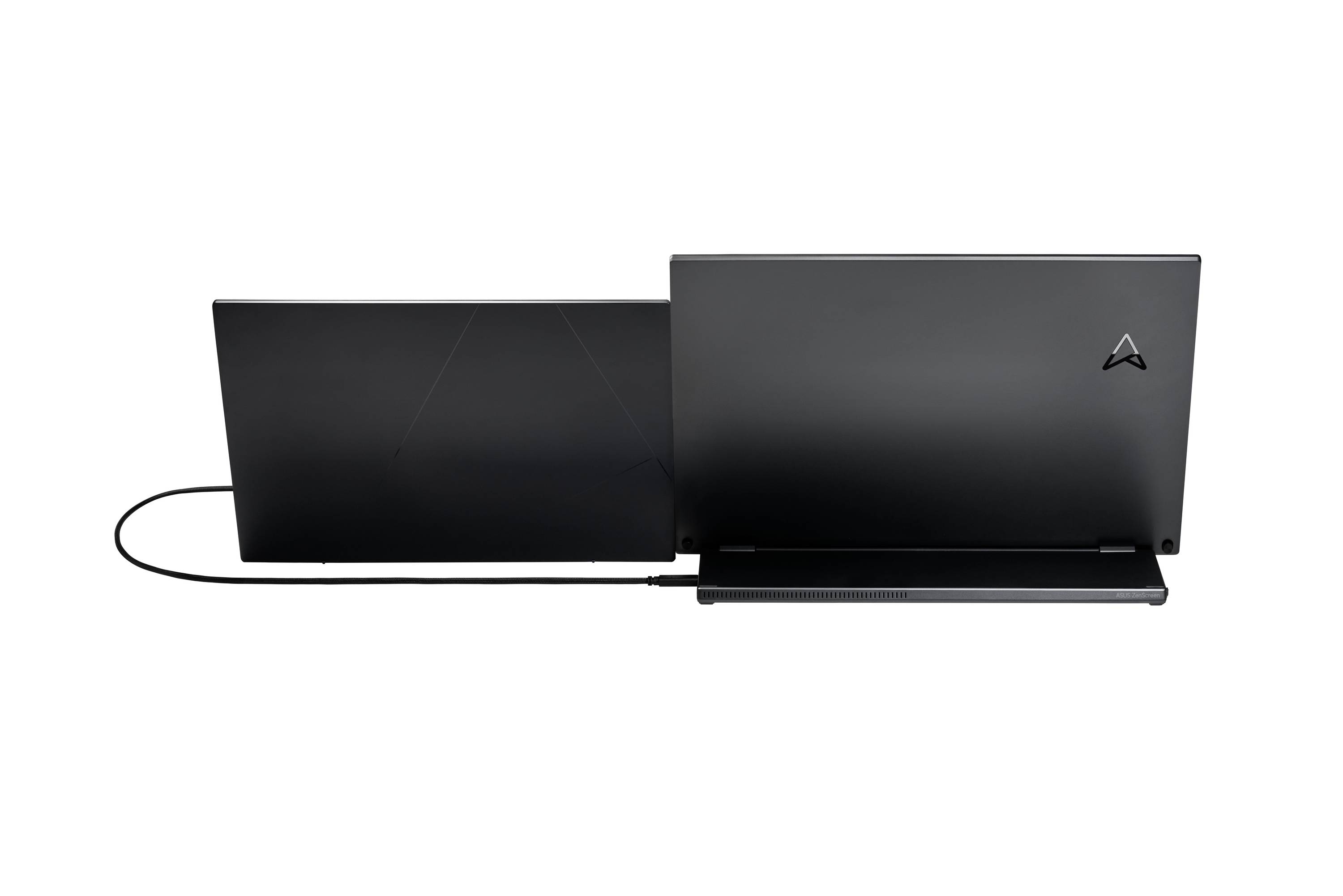 Two black laptops, back to back, are connected by a single cable. They are positioned on a white background.