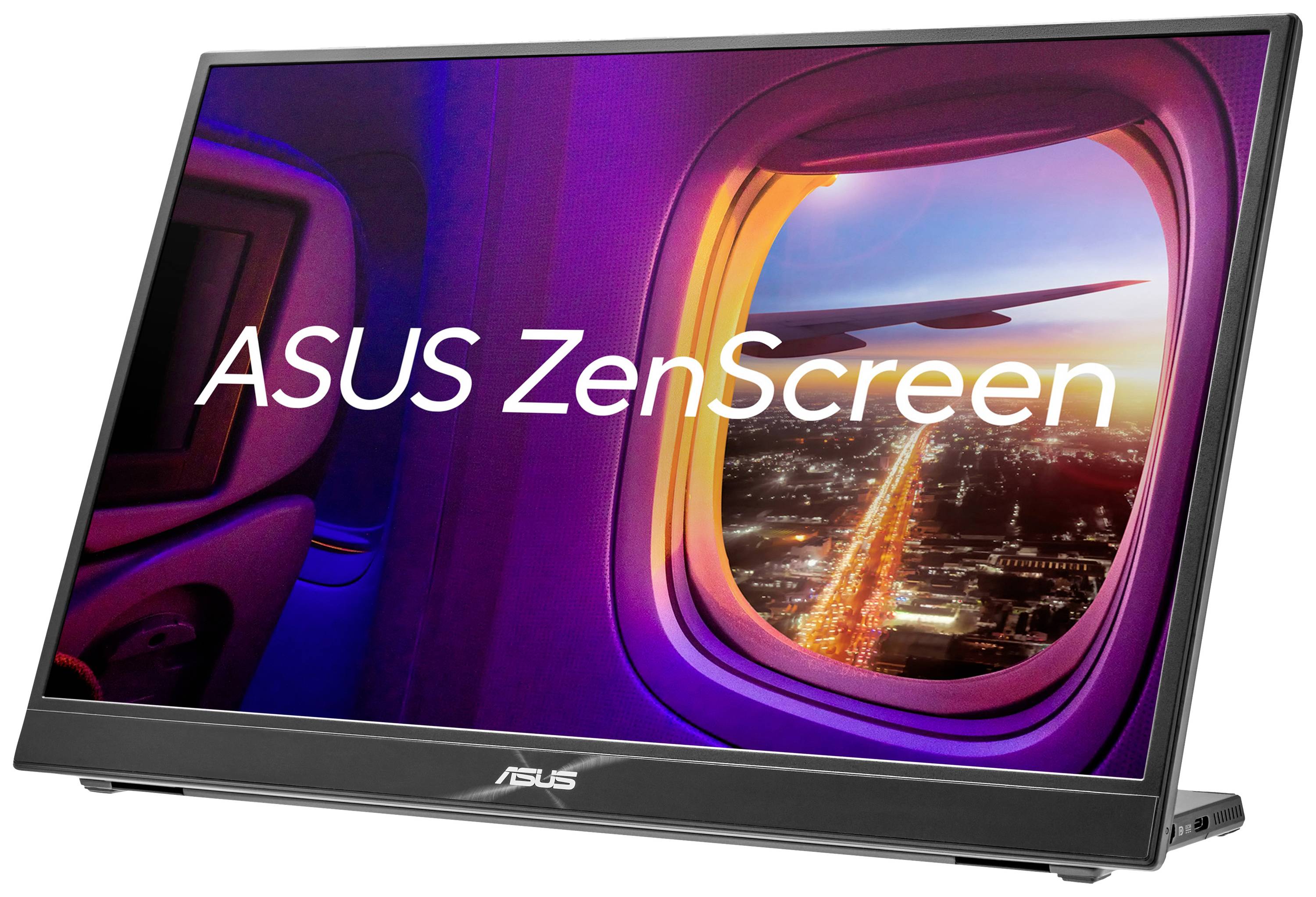 An ASUS ZenScreen monitor displays a window view from an aircraft with a glowing cityscape at night.