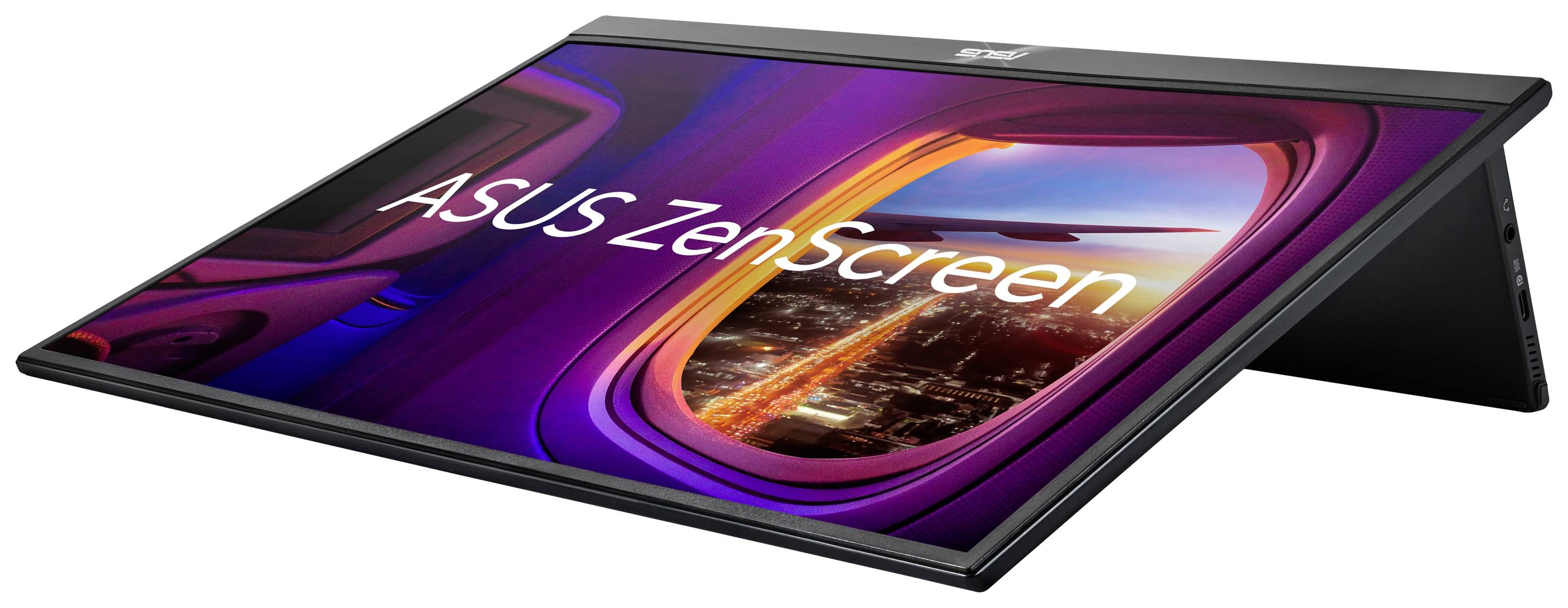 Portable ASUS ZenScreen monitor showing an aircraft window view overlooking a city illuminated at night.