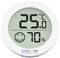 Digital display of a thermometer and hygrometer: 25 degrees Celsius, 70 percent humidity, with a smiley face symbol.