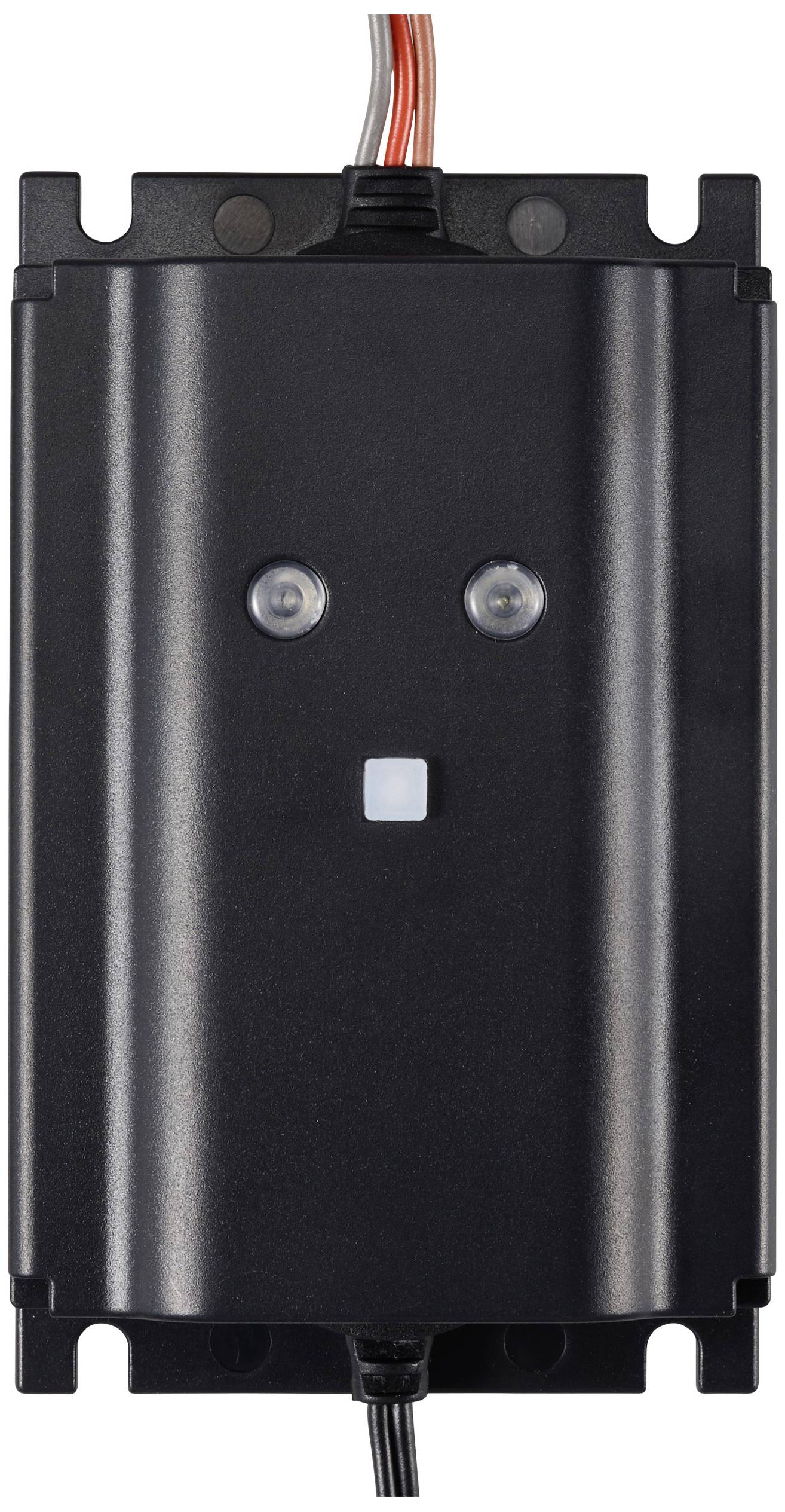 A black electronic device with two round buttons and a square switch in the centre; wires at the top and bottom.